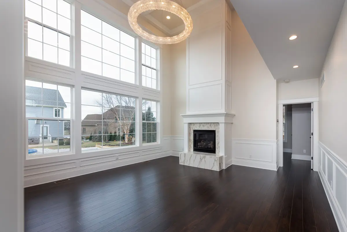 Open living room with stone fireplace
