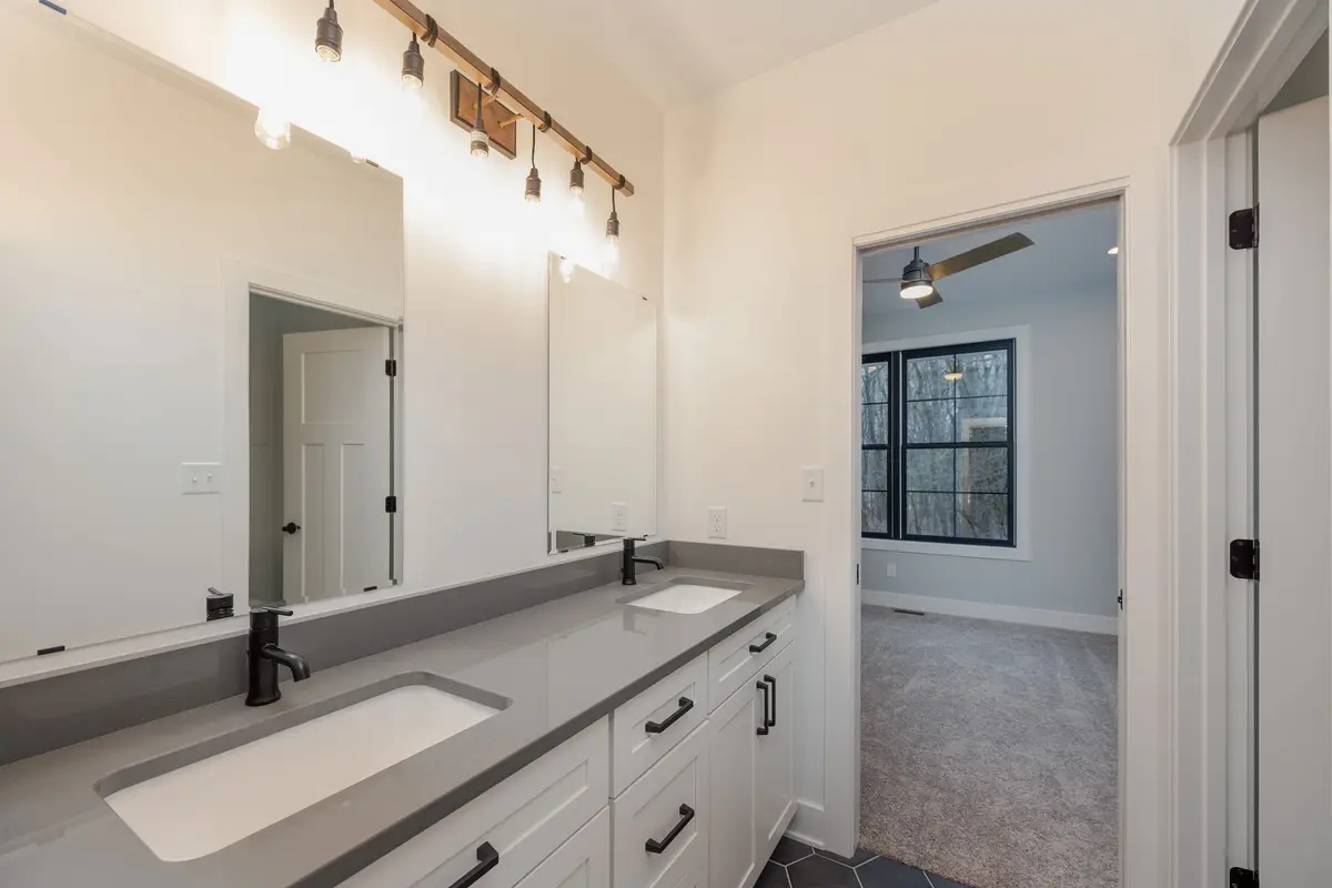 Long double vanity with framed mirror