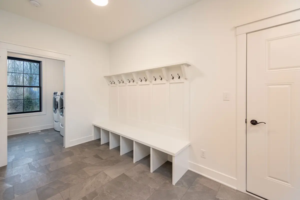 Mudroom with bench and built-in lockers
