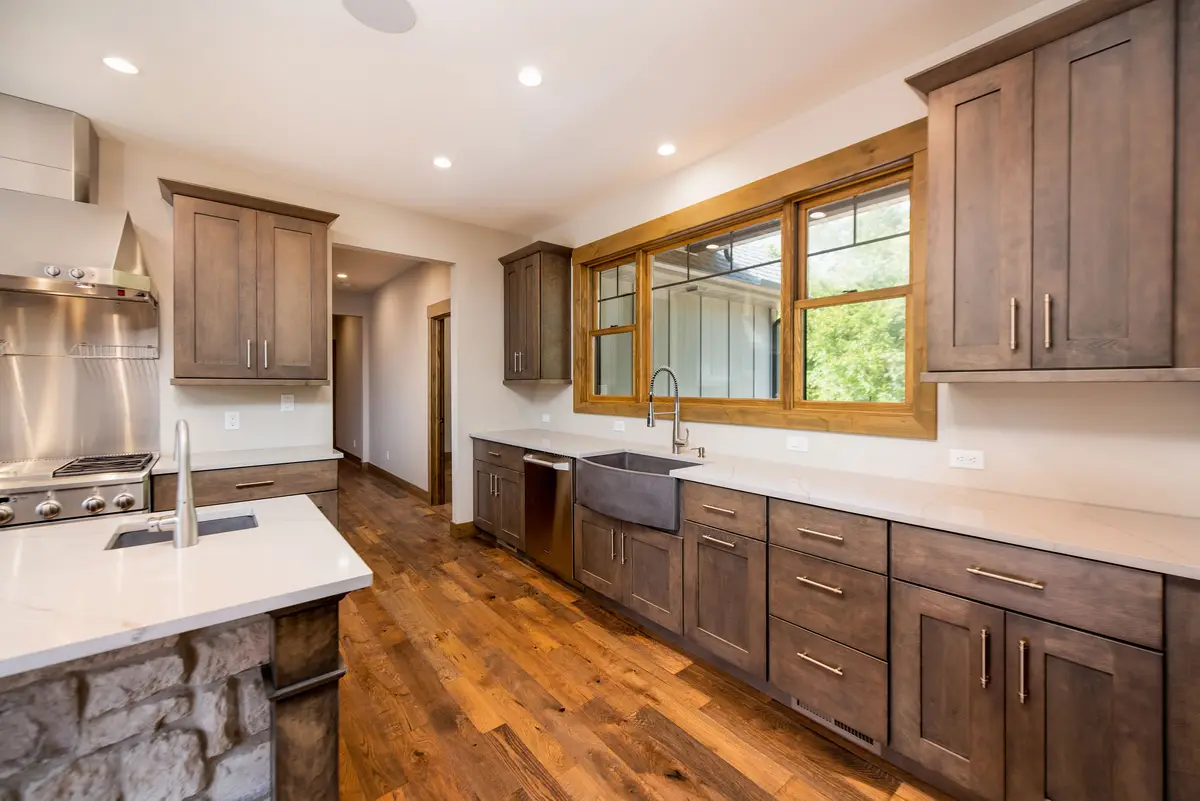 Kitchen with double-bowl sink and pendants