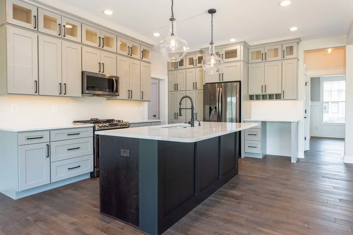Two-tone kitchen with island seating
