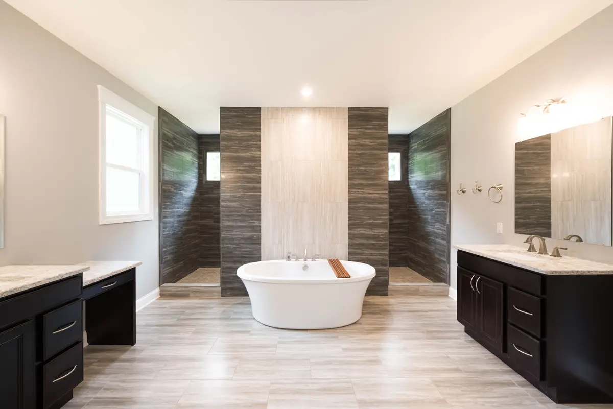 Master bath with vessel sink and chandelier