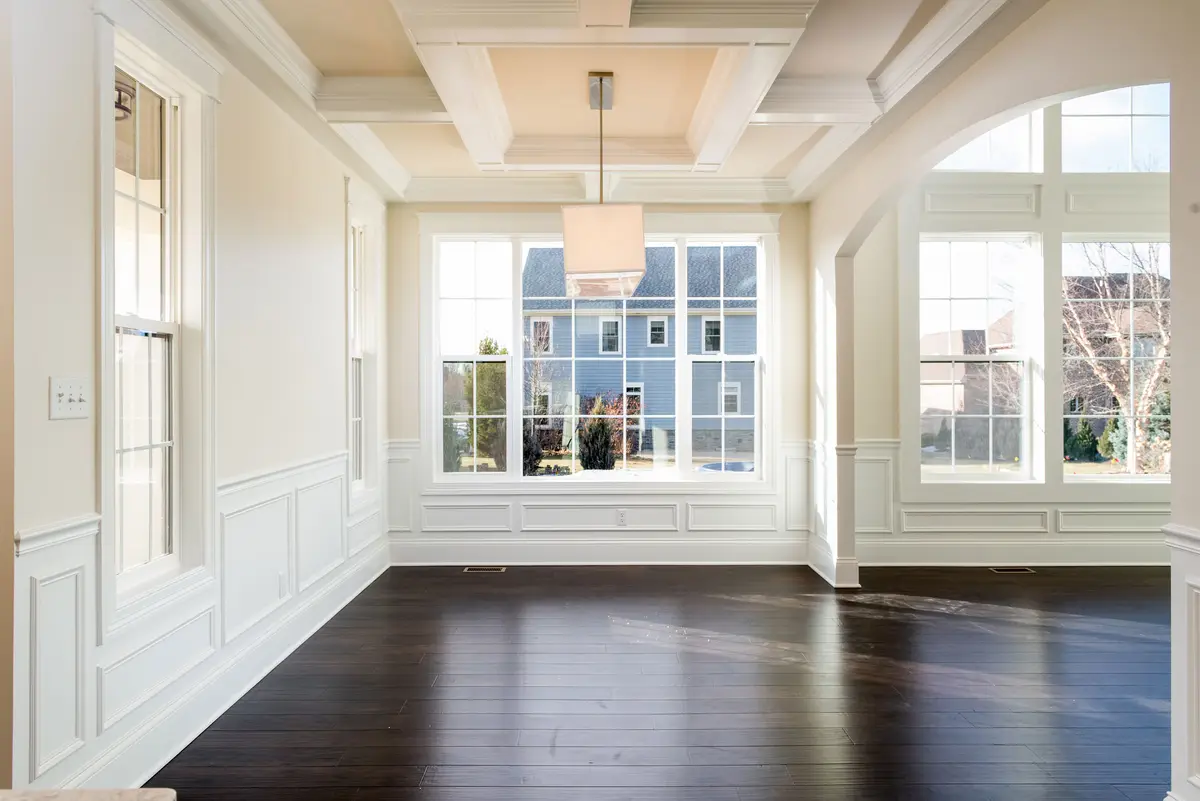 Dining area with coffered ceiling and shiplap accents