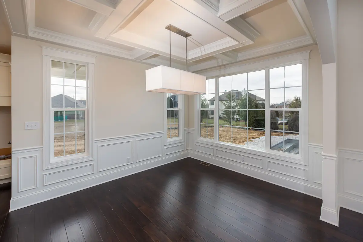 Open living and dining with coffered ceiling