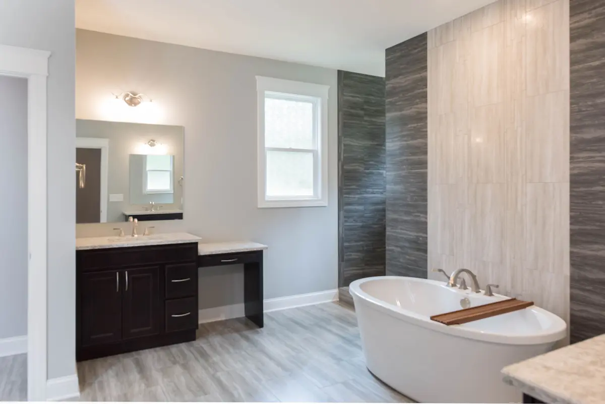 Master bath with freestanding tub and tile floor