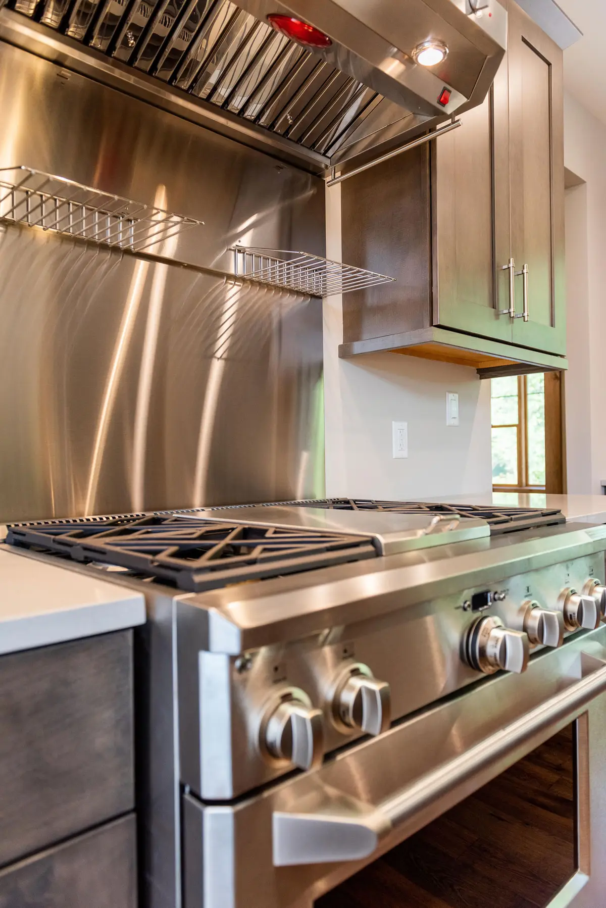 Cooktop detail with brass fixtures