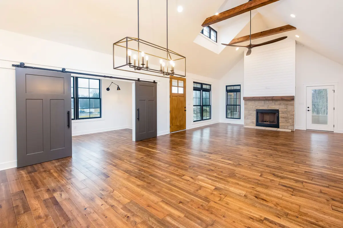 Great room with timber beams and double doors