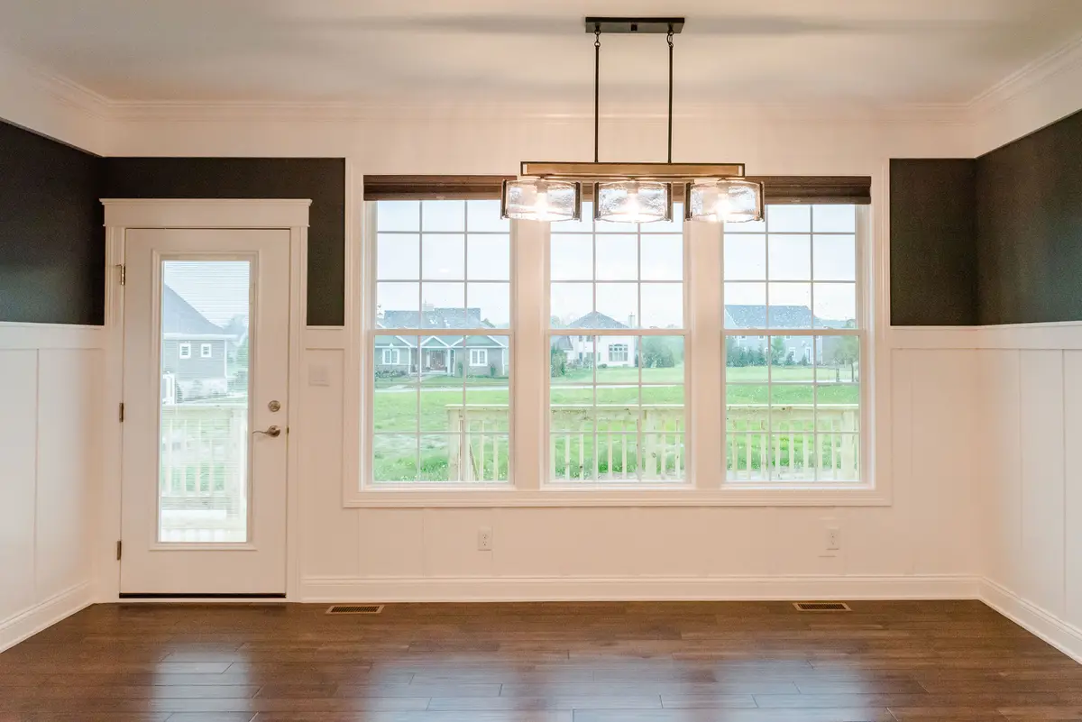 Dining room with bay window and chandelier