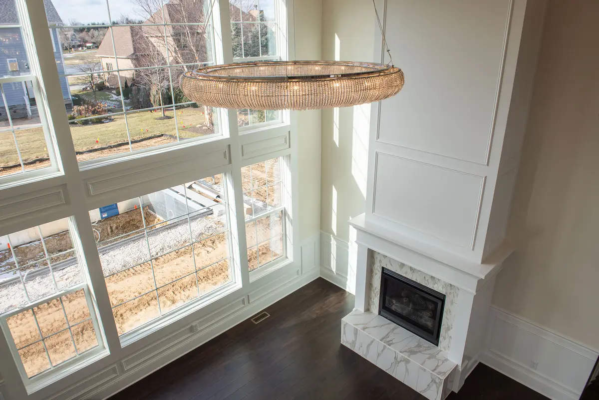 Foyer detail with chandelier and entry windows