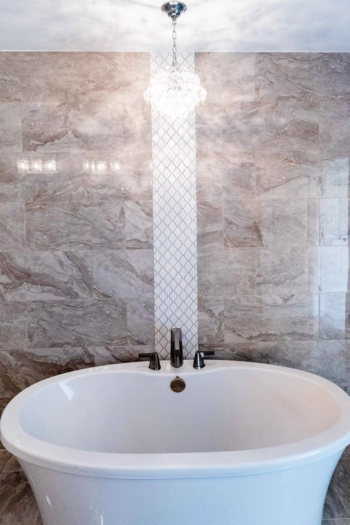 Marble master bath with freestanding tub