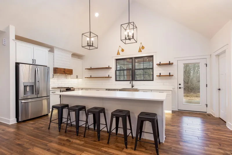 Open kitchen with island and pendant lighting