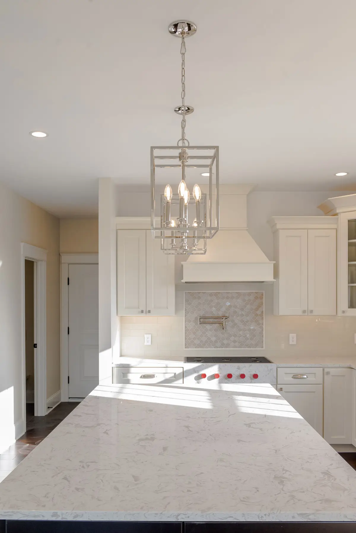 Wood-wrapped hood over subway tile