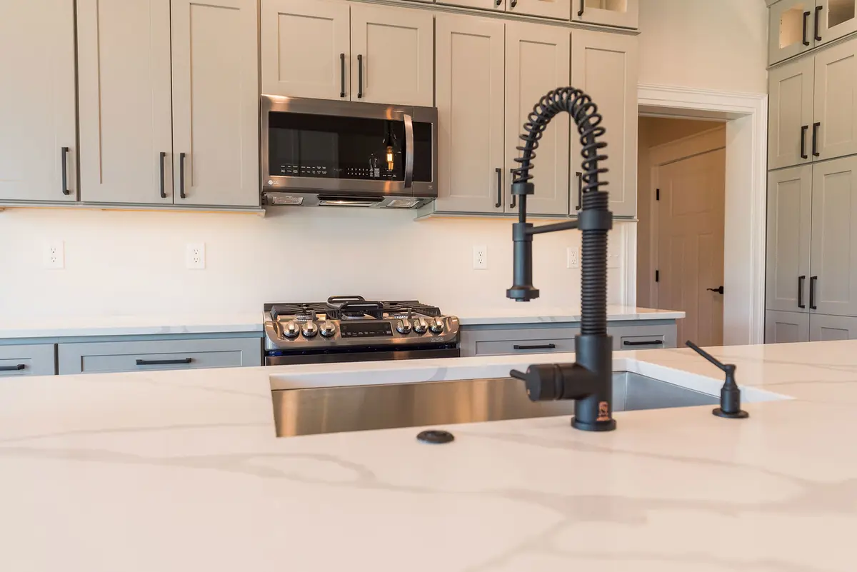 Stainless cooktop with custom range hood