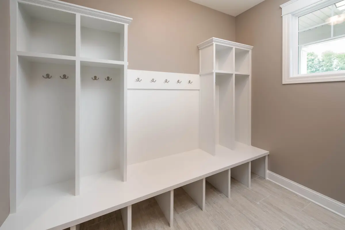 Mudroom with custom bench and cubbies