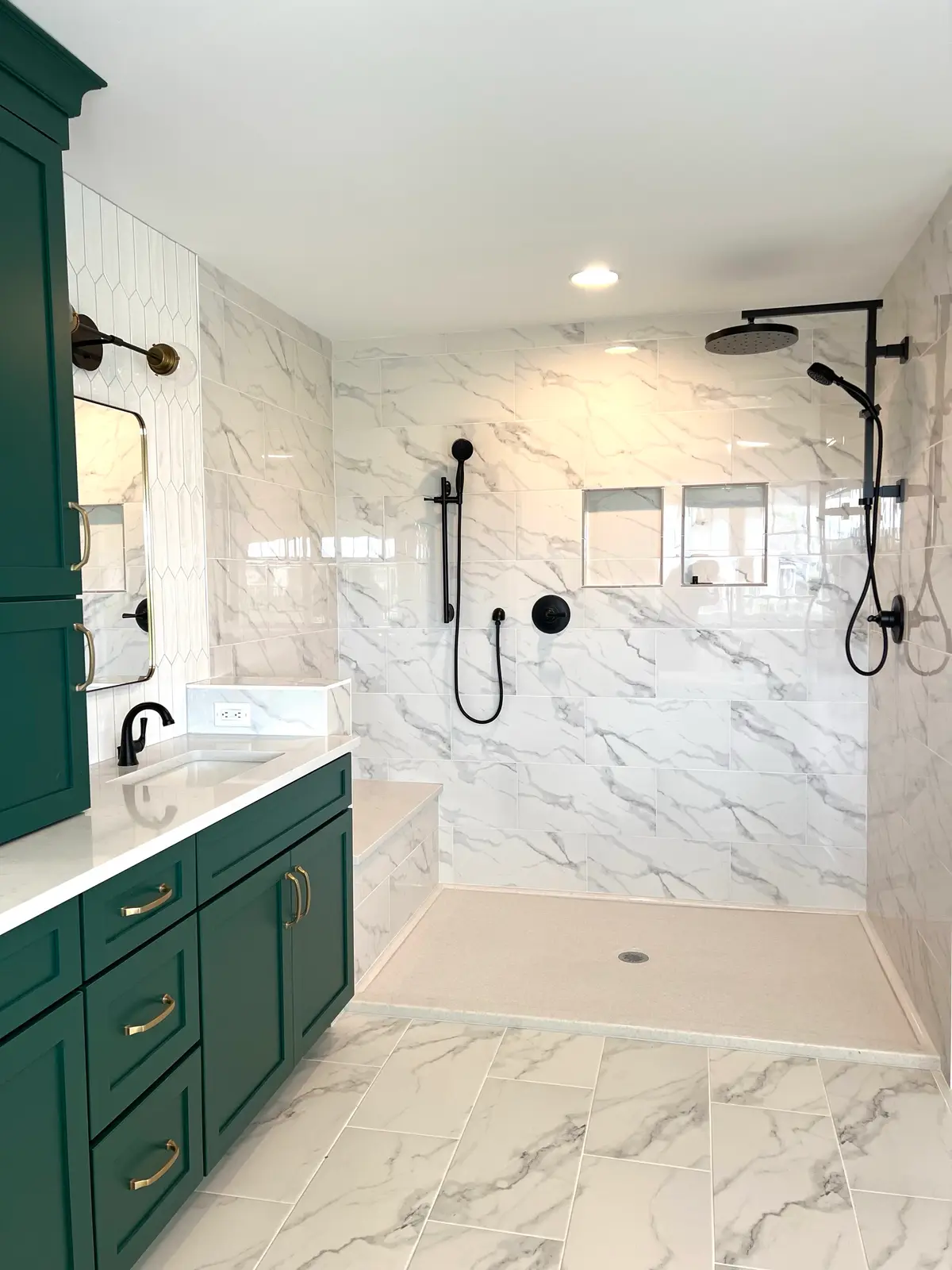 Walk-in shower with marble-look tile and matte black rain head